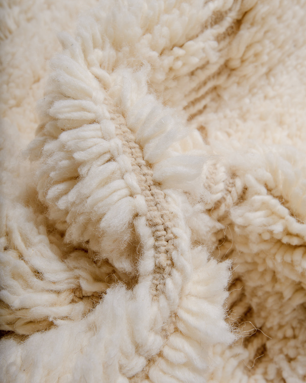 Detail of wool Berber rug showing density of pile.